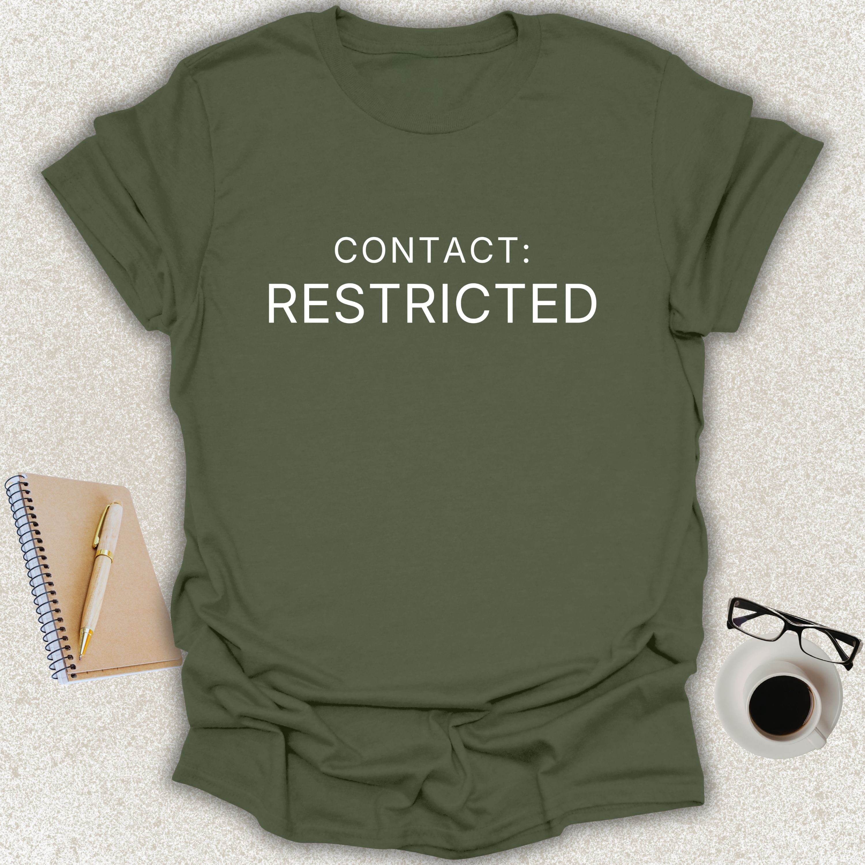 CONTACT RESTRICTED minimalist typography t-shirt on military green shirt with white typography