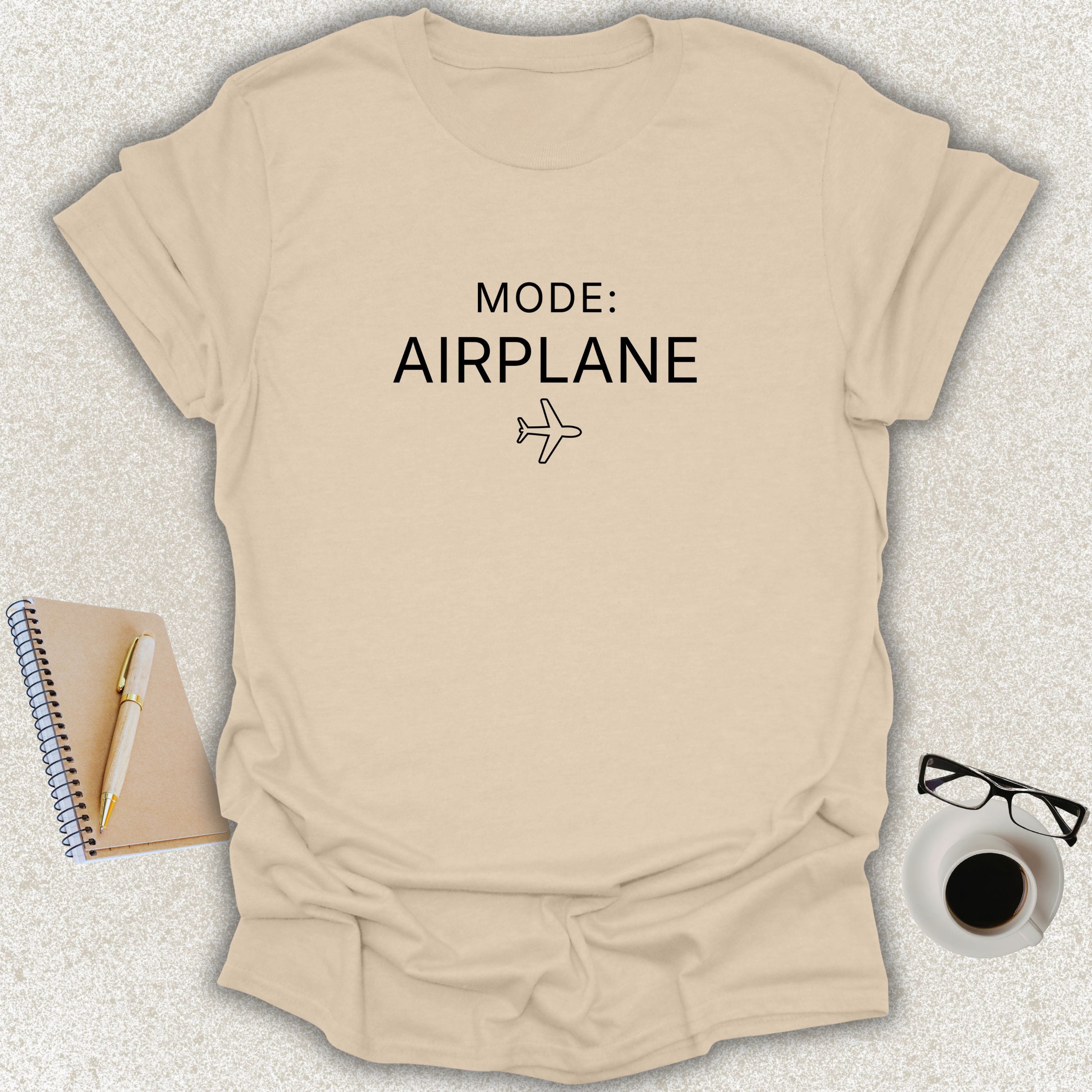 MODE: AIRPLANE minimalist typography t-shirt with airplane icon on sand Gildan Softstyle shirt